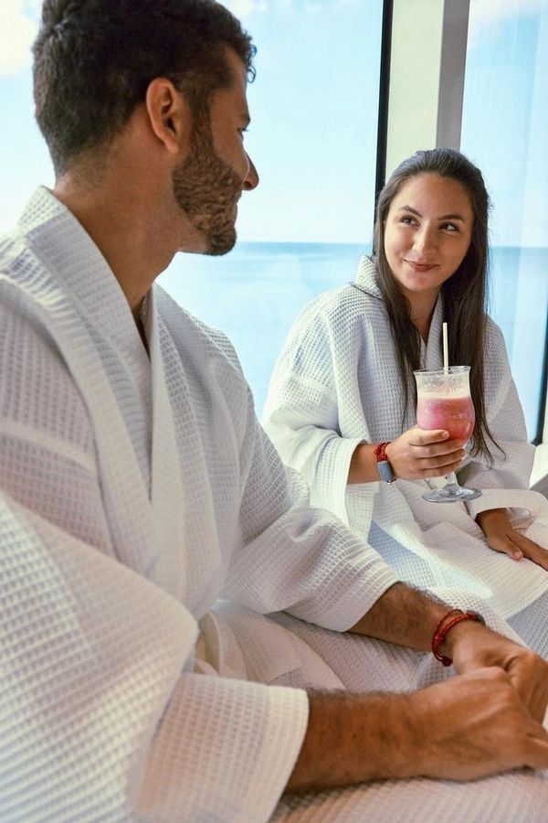 Couple enjoying a spa treatment on a cruise