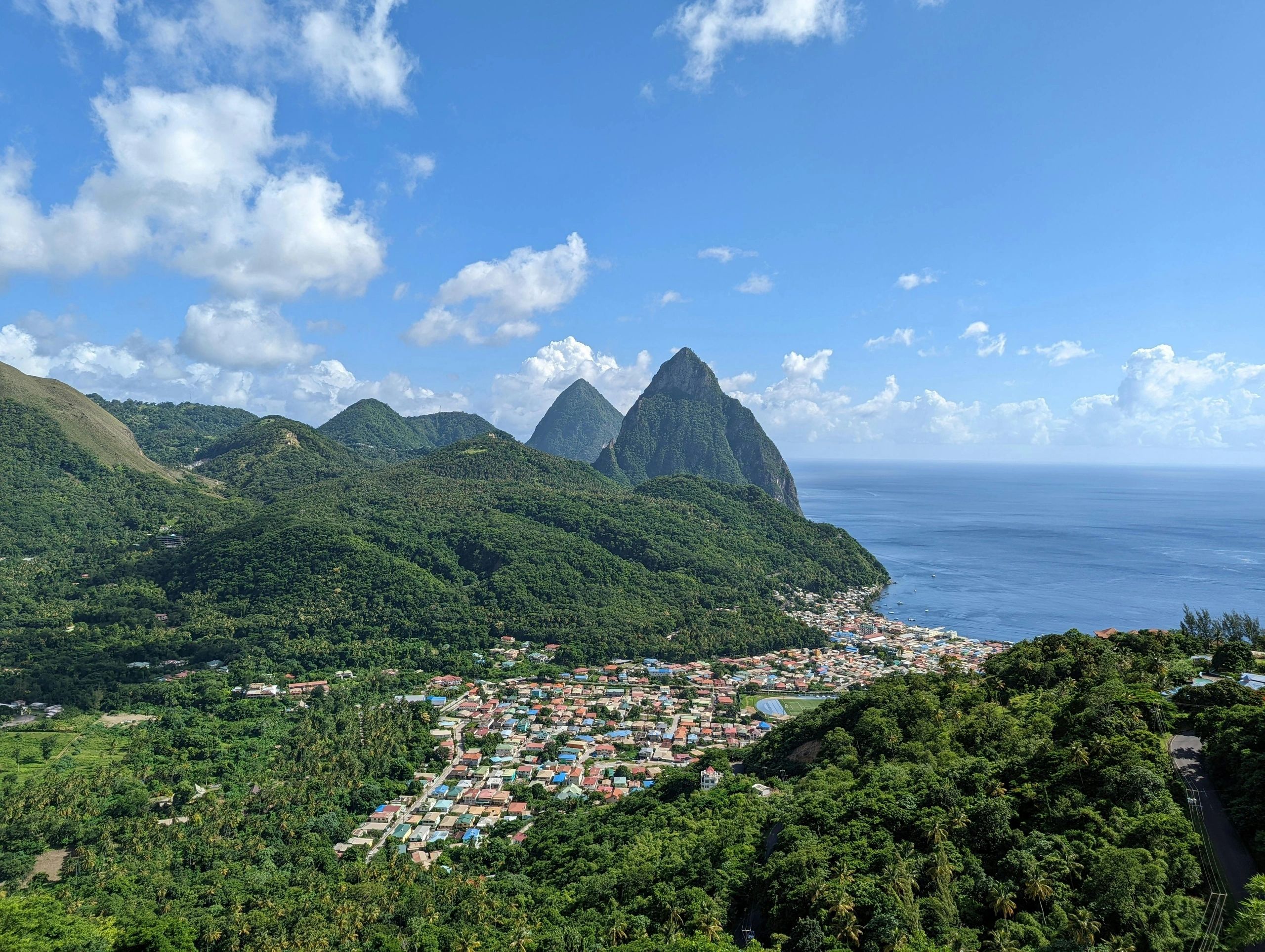 Green mountain peaks overlooking a tropical lagoon