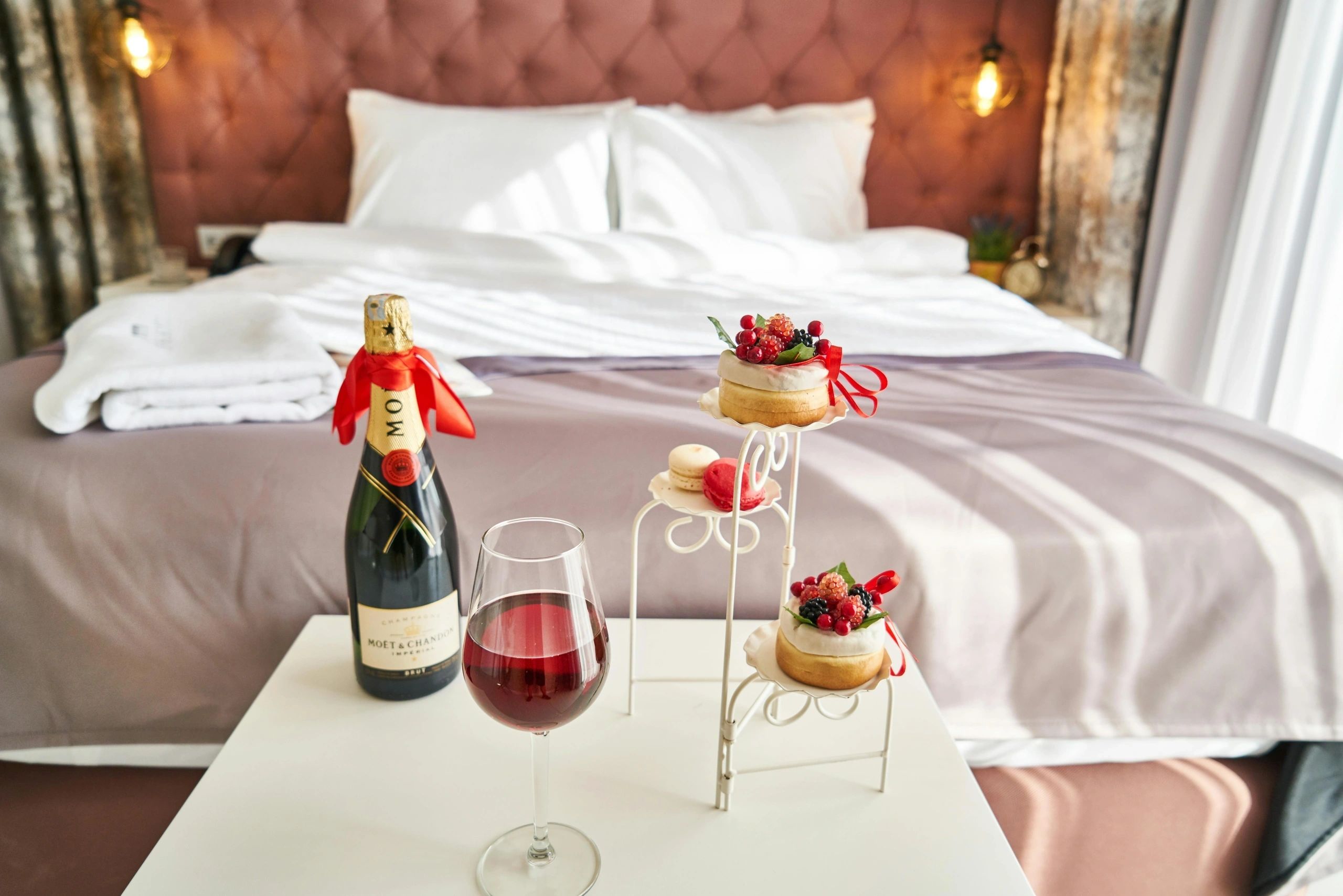 Room service with wine and pastry
