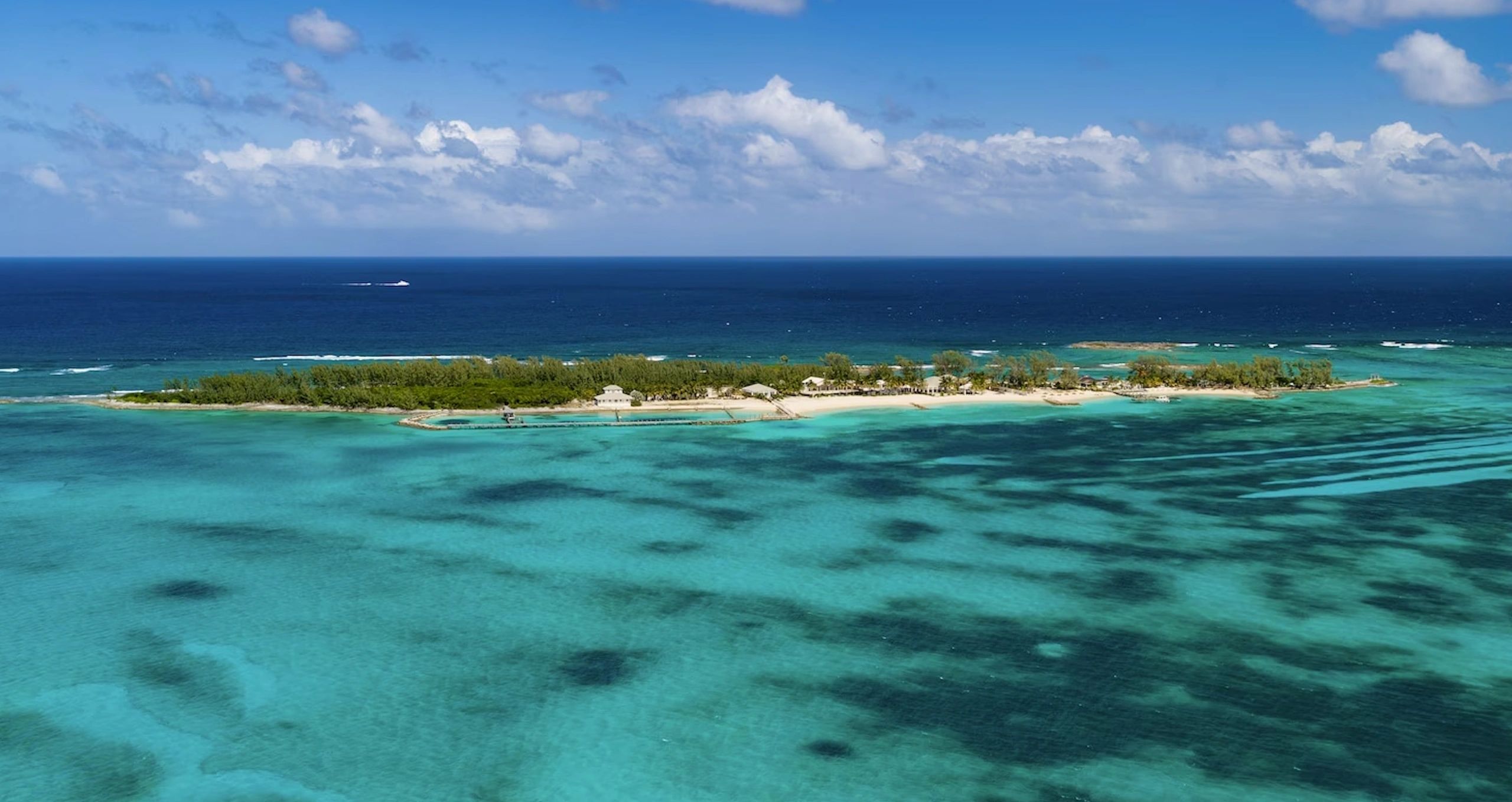 Small tropical island surrounded by turquoise water