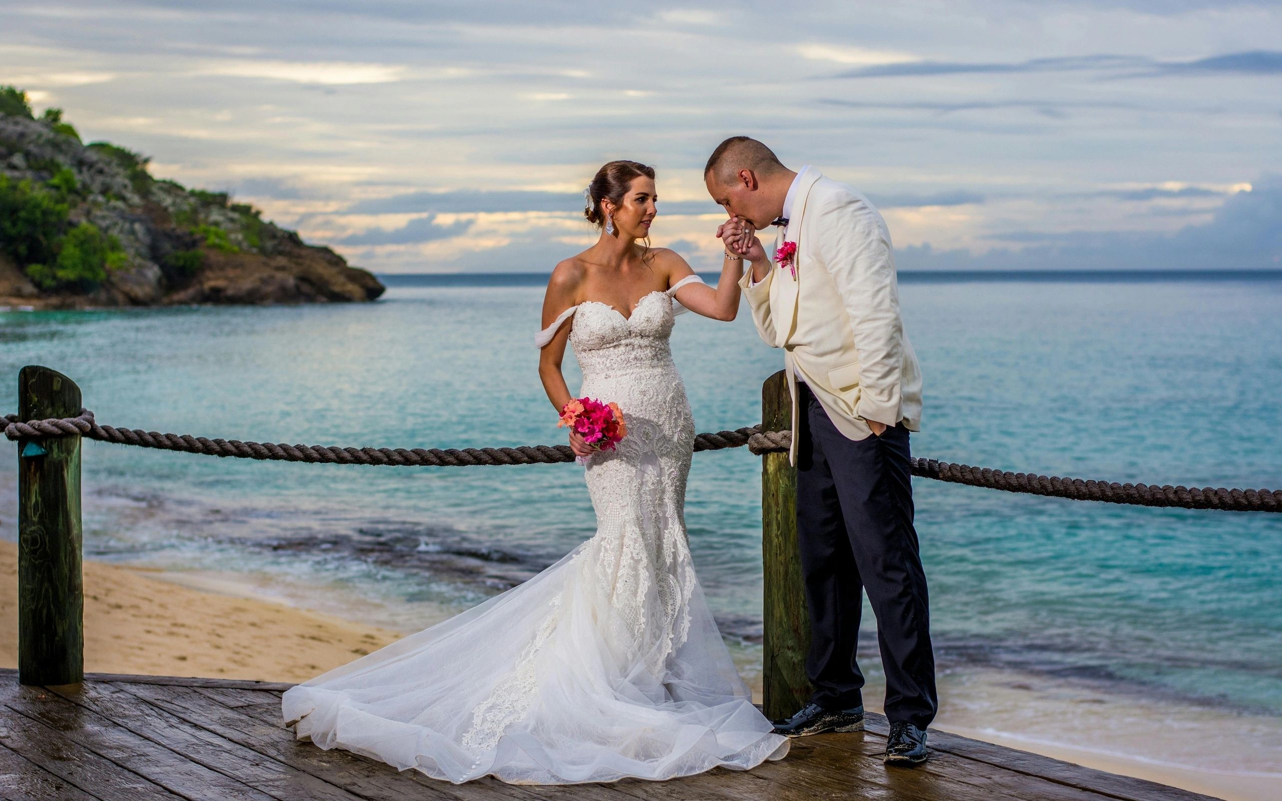 couple getting married overlooking the ocean