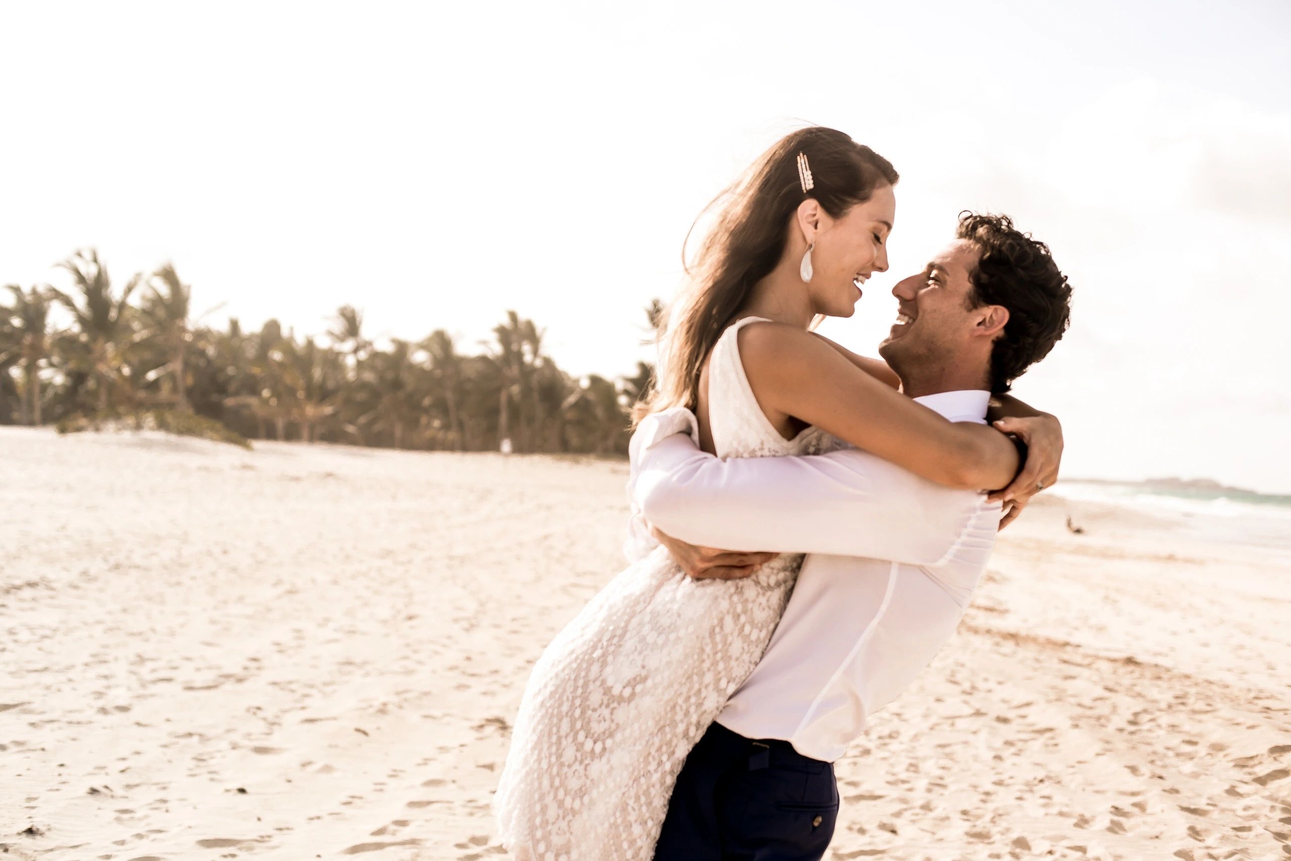 Bride and Groom on beach at Hard Rock Hotel