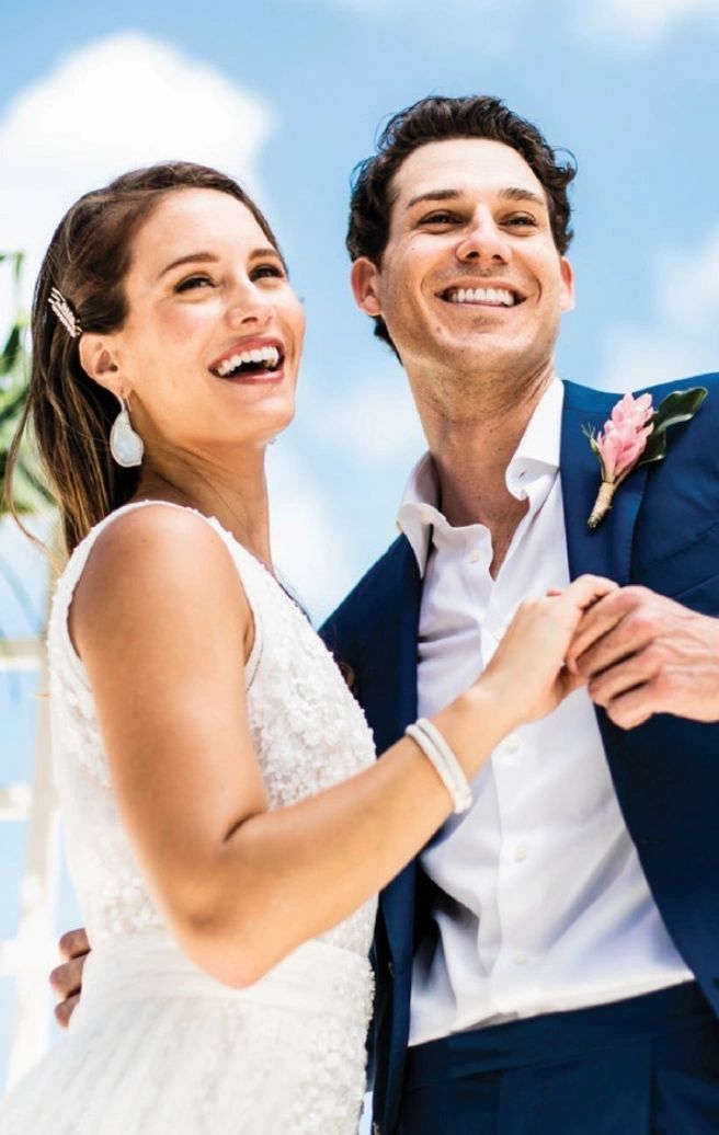 Newlyweds celebrating together outdoors