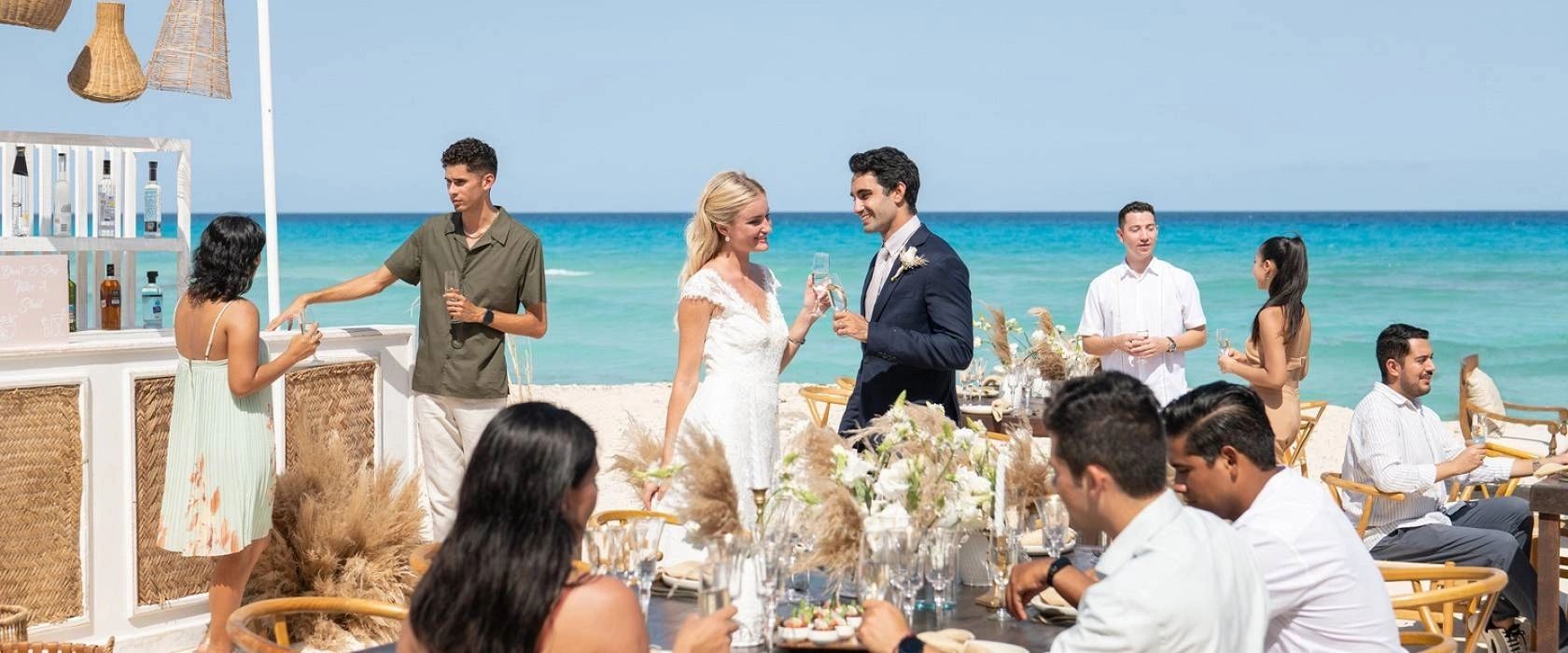 Wedding couples and guests celebrating at Seadust Cancun