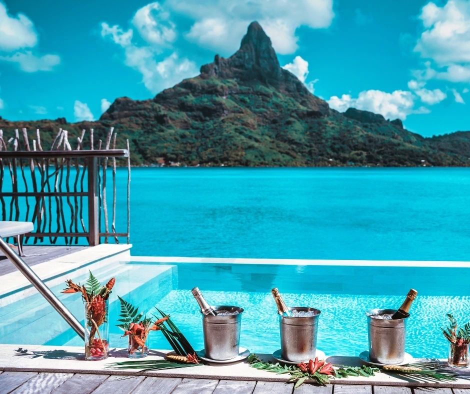 Bora Bora mountain and turquoise lagoon beyond a shaded terrace